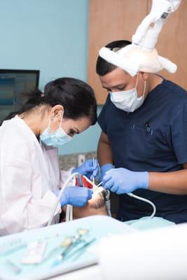 Dr. Ortega working with a patient.