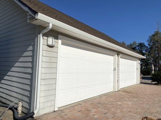 New gutters and drain spout. They even attached the hose.