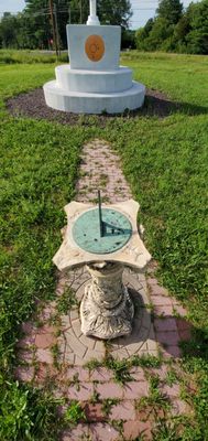 Sundial facing memorial