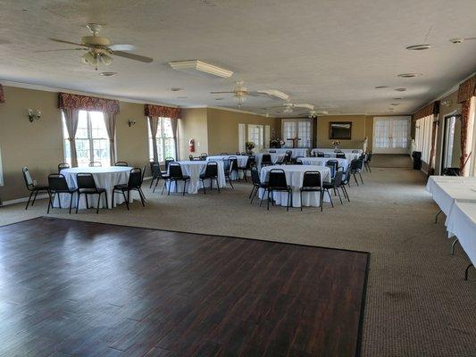 Inside the clubhouse. Second level. Looks like some sort of banquet space.