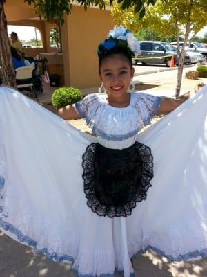 Pretty folklorico dancer during fiestas