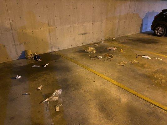 Trash spread all over the parking garages.