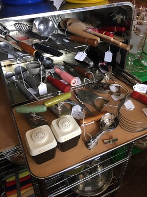 Bread box full of vintage utensils