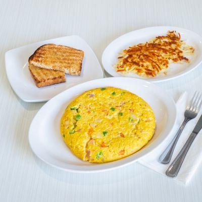 Farm fresh, air whipped omelet with all the fixins