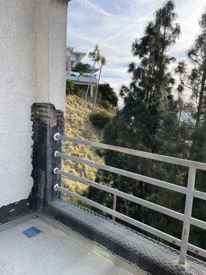 Stucco repairs around leaky deck