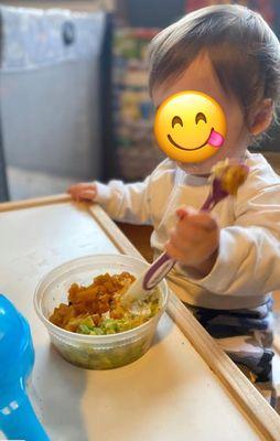 Learning how to use utensils and sit at the table