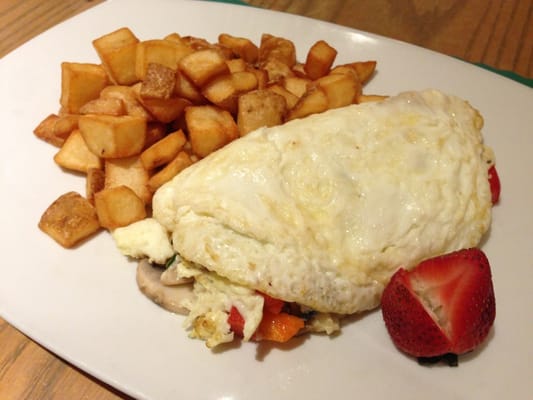 Egg white veggie omelet with home fries