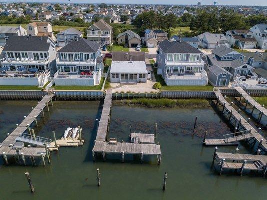 Spectacular bayfront home for sale with 2 boat slips.