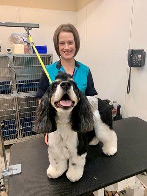 Our groomer, with Nora the cocker spaniel