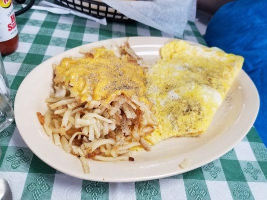 Ham and cheese omelette and hashbrowns with onions and cheese