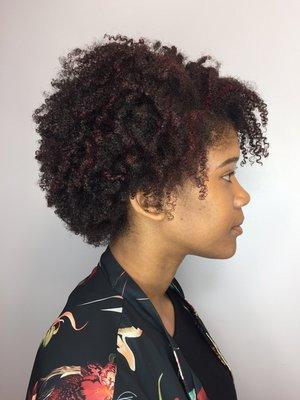 Red pops of curls