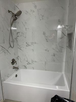 Full Bathroom Remodel - The bathtub, tile and, plumbing trim made a great combo!