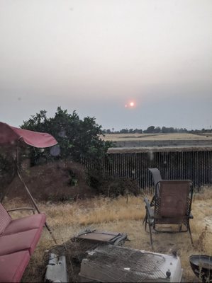 The dead brown fields on a smoky day