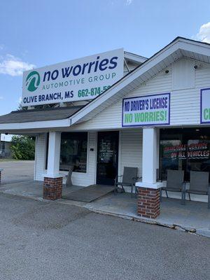 No Worries Automotive Group - Olive Branch storefront, mid-afternoon, mid-aperture, low-exposure.