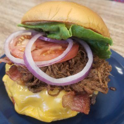 Triple threat burger: Burger,bacon, bbq shredded beef (Thursday only)