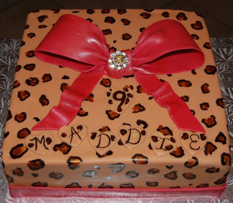 Leopard Spotted, fondant over buttercream Birthday Cake, sugar Bow