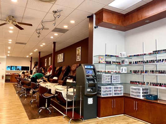 OPI color selections and wall of spa chairs.Cash tips ;discount for full payment in cash. Men are welcomed.