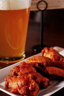 Chicken wings 
Light Panko breading,  deep fried to perfection and topped with your choice of one of three sauces: