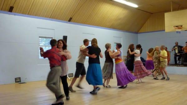 Contra dancing to live music on Friday nights