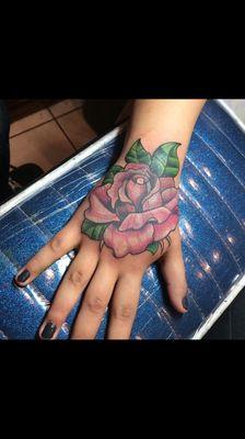 Rose on hand by Carey