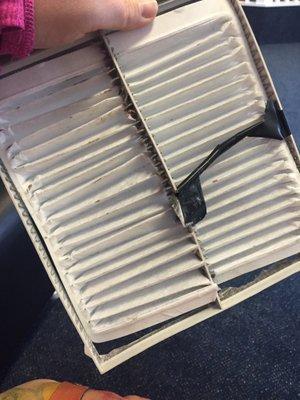 See review- this is jiffy lube's idea of replacing an air filter