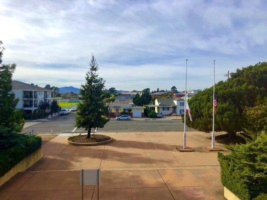 View from the 2nd door of the courtyard, 37th Street, and the DeJean Middle School field.