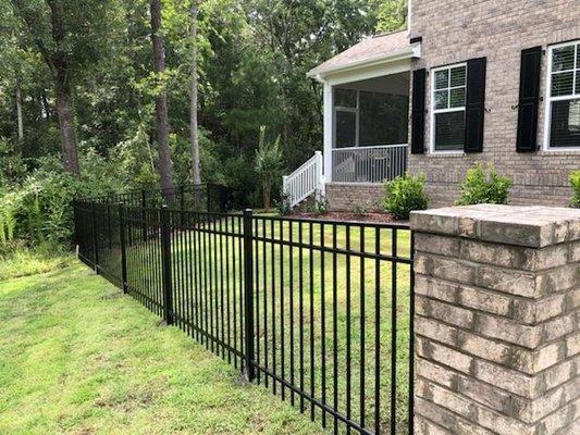 Aluminum mounted to brick columns