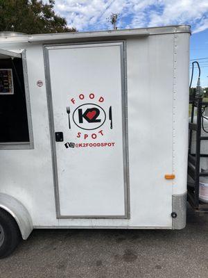 logo on side of food truck trailer