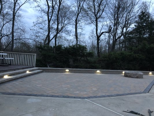 Patio done in pavers with retaining wall and fire pit around. LED lighting added to the wall for some out door lighting! Jobsite-Cheshire