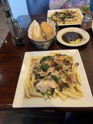 Tender chicken with mushrooms,, tomatoes, and pasta