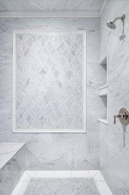 Artistic Tile Claridges mosaic in Bianco Carrara Shower Panel. Space designed by Jaureguir Architect and Caroline McCallister.