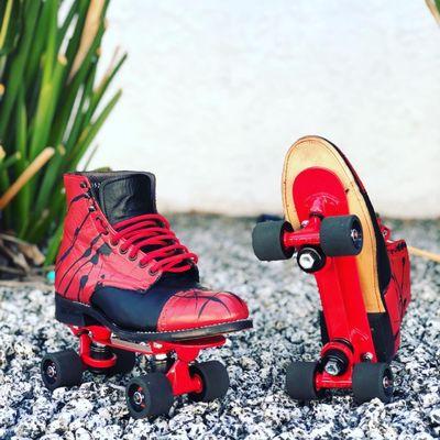 Stacy Baldwin boot custom muiti-color dye. Splatter paint. Red powder coat. Fomac clays shaved down with abec 7 bearings