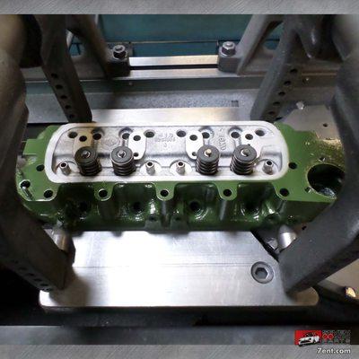 A classic Mini cylinder head about to be resurfaced in the Seven machine shop