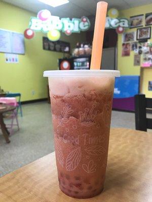 Strawberry tea with lychee boba