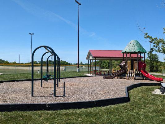 Small kid's playground by the baseball fields.