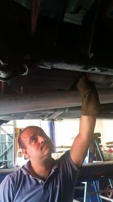 Our welder Salvador aka Chava fitting different mufflers to see which sound appeals most to the customer before he begins welding.