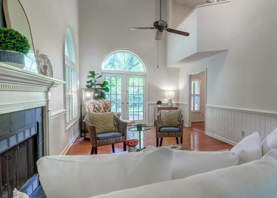 Two-story great room expands the spacious living space.