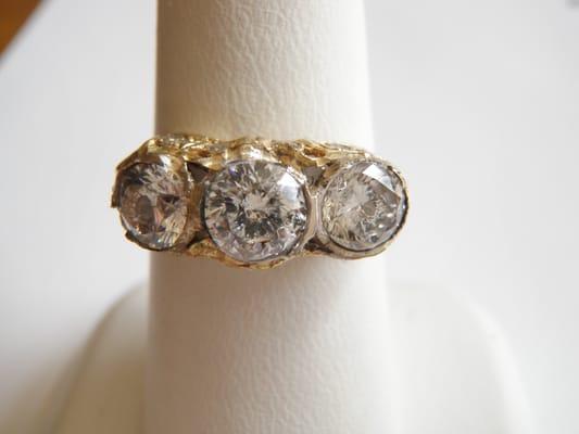 This customer wanted a new ring utilizing the diamonds in this old ring