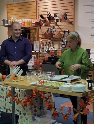 Store manager Chad and Chef Marlene teaching knife skills at one of our free kitchen parties.