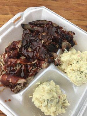 Sample plate: pork ribs, pulled pork, brisket and potato salad