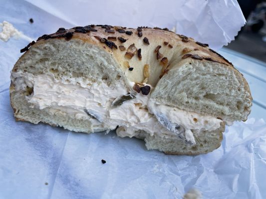 Onion bagel with jalapeño cream cheese