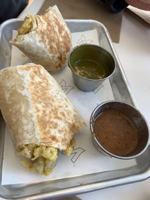 Yummy delicious breakfast burrito with green and red sauce.  You can tell they are house made from scratch.  Pure delicious perfection!