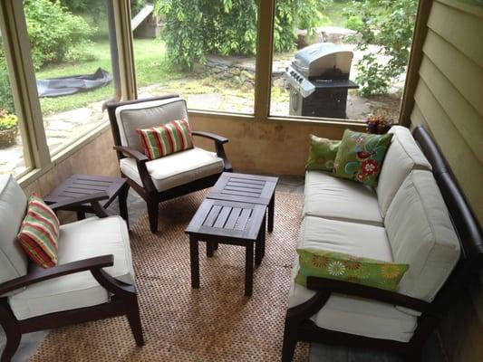 Screened porch, doubles as wood storage area in winter months.