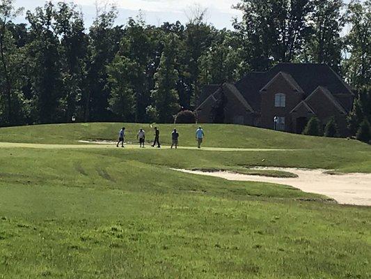 Five guys playing the green - it took forever!