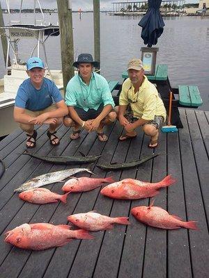 Matt, Luke, and Keith didnt mind a little rain today. Very nice limit of Red Snapper and kings to go with them.