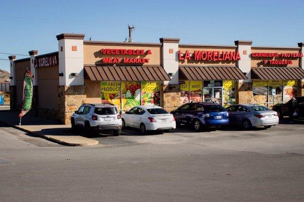 Outside LA MORELIANA MEAT MARKET AND TAQUERIA!      Showing good parking lot