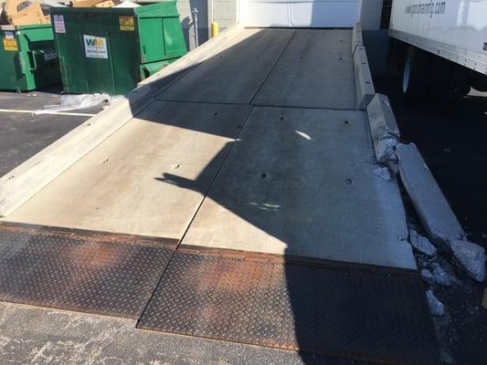 Ramp was damaged and misaligned after driver truck backed into it