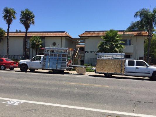 Here is a photo of a couple of our trucks at portofino apartments. We upgraded all 150 windows and doors.