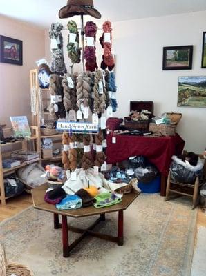 Alpaca yarn and wearables, plus a gallery of local artwork for sale.