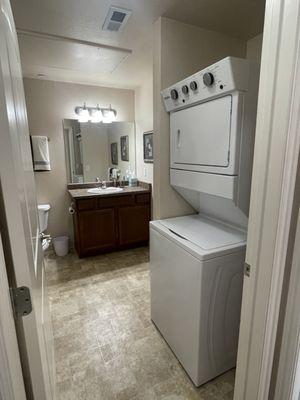 bathroom and washer and dryer